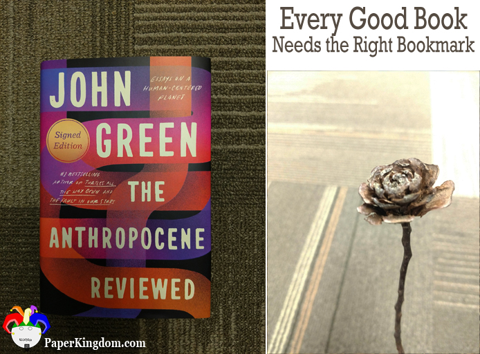 The Anthropocene Reviewed by John Green marked with a wooden rose