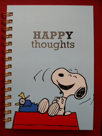 m journal with Snoopy on the front