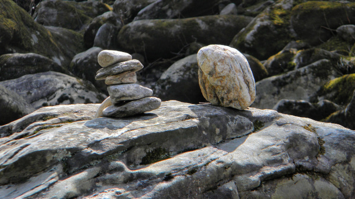 stacked rocks at the river